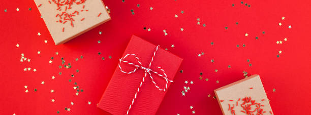 istock New Year or Christmas presents red background 1011474060