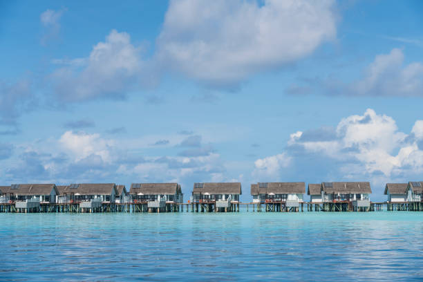istock Distant tropical resort on Maldives 1011476592