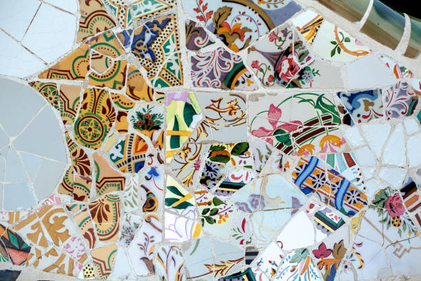 istock Mosaic in the park in Barcelona, Spain. Ceramic puzzles, texture, background 1011486494