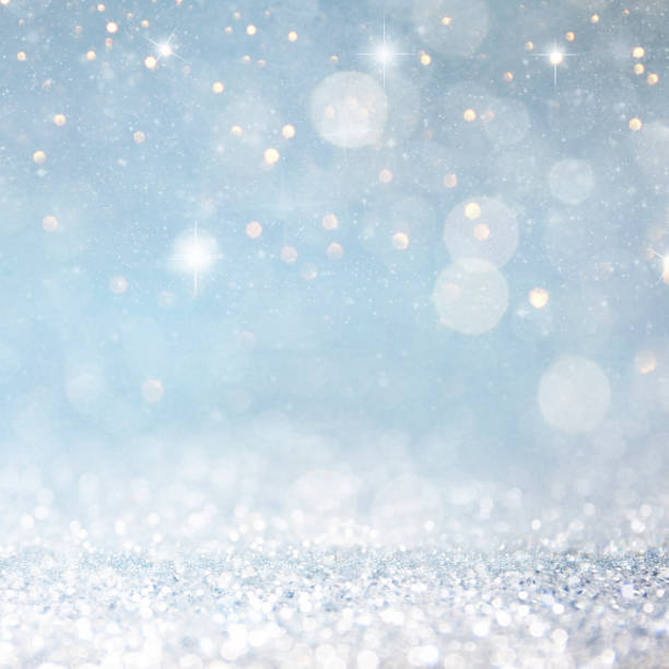 istock Christmas light background.  Holiday glowing backdrop. Defocused Background With Blinking Stars. Blurred Bokeh. 1011489442
