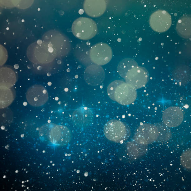 istock Christmas light background.  Holiday glowing backdrop. Defocused Background With Blinking Stars. Blurred Bokeh. 1011489474