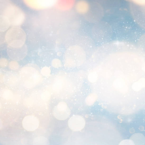 istock Christmas light background.  Holiday glowing backdrop. Defocused Background With Blinking Stars. Blurred Bokeh. 1011489800