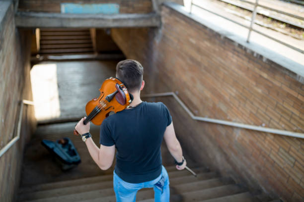 istock Street musician playing violin 1011489986