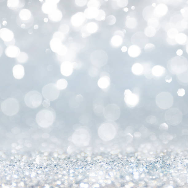 istock Christmas light background.  Holiday glowing backdrop. Defocused Background With Blinking Stars. Blurred Bokeh. 1011490114