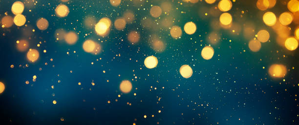 istock Christmas light background.  Holiday glowing backdrop. Defocused Background With Blinking Stars. Blurred Bokeh. 1011490558