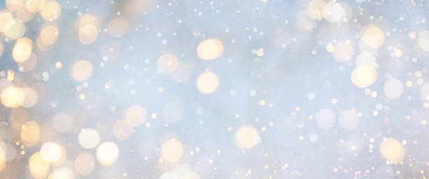 istock Christmas light background.  Holiday glowing backdrop. Defocused Background With Blinking Stars. Blurred Bokeh. 1011490664