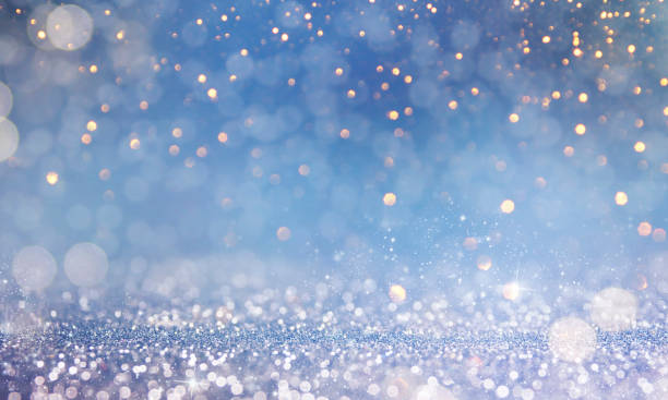 istock Christmas light background.  Holiday glowing backdrop. Defocused Background With Blinking Stars. Blurred Bokeh. 1011493292