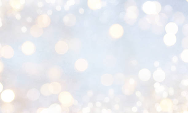 istock Christmas light background.  Holiday glowing backdrop. Defocused Background With Blinking Stars. Blurred Bokeh. 1011493294