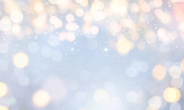 istock Christmas light background.  Holiday glowing backdrop. Defocused Background With Blinking Stars. Blurred Bokeh. 1011493822