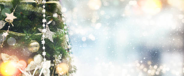 istock Christmas tree with ornaments.  Holiday glowing backdrop. Defocused Background With Blinking Stars. Blurred Bokeh. 1011493896