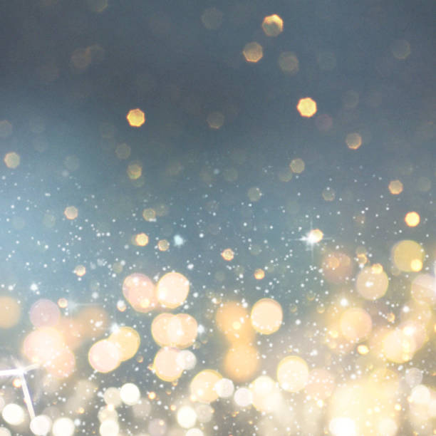 istock Christmas light background.  Holiday glowing backdrop. Defocused Background With Blinking Stars. Blurred Bokeh. 1011498026