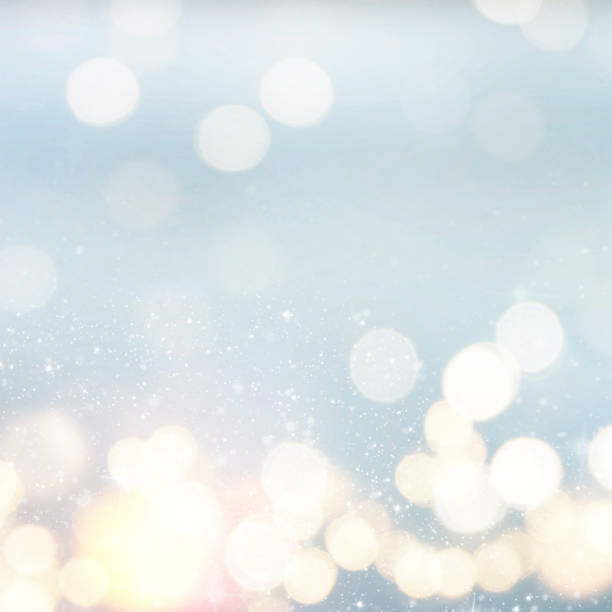 istock Christmas light background.  Holiday glowing backdrop. Defocused Background With Blinking Stars. Blurred Bokeh. 1011501088