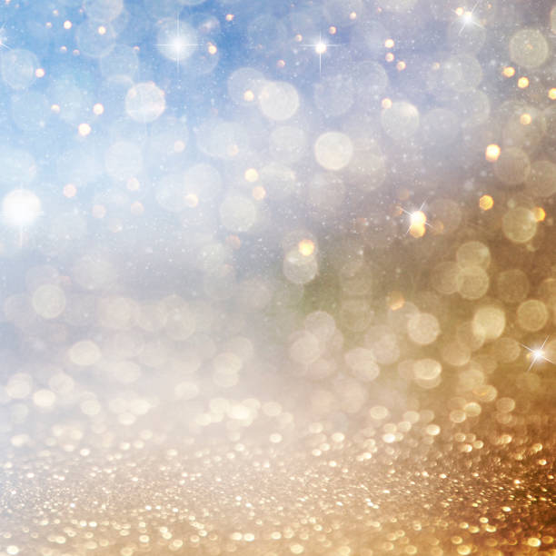 istock Christmas light background.  Holiday glowing backdrop. Defocused Background With Blinking Stars. Blurred Bokeh. 1011501474
