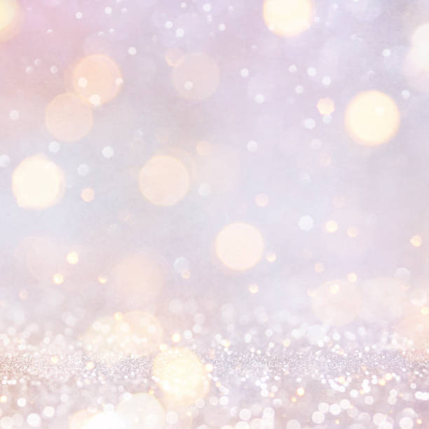 istock Christmas light background.  Holiday glowing backdrop. Defocused Background With Blinking Stars. Blurred Bokeh. 1011501720