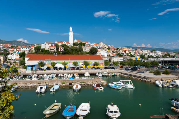 Novi Vinodolski, Croatia - July 30, 2018:Boats moored in the harbor on a hot summer day in the coast of Novi