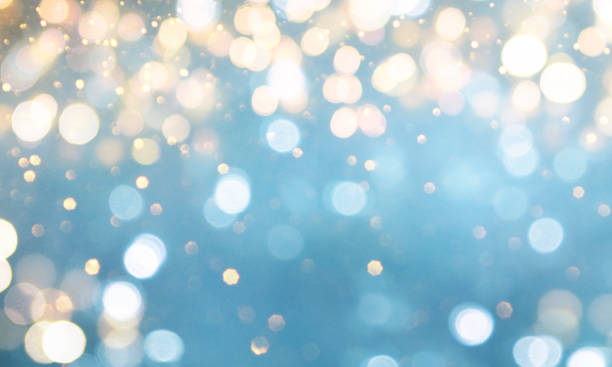 istock Christmas light background.  Holiday glowing backdrop. Defocused Background With Blinking Stars. Blurred Bokeh. 1011502128