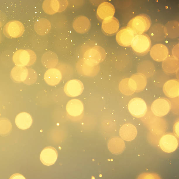 istock Christmas light background.  Holiday glowing backdrop. Defocused Background With Blinking Stars. Blurred Bokeh. 1011502372