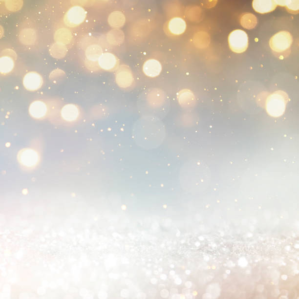 istock Christmas light background.  Holiday glowing backdrop. Defocused Background With Blinking Stars. Blurred Bokeh. 1011502716