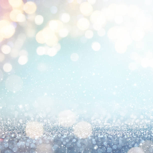 istock Christmas light background.  Holiday glowing backdrop. Defocused Background With Blinking Stars. Blurred Bokeh. 1011502772