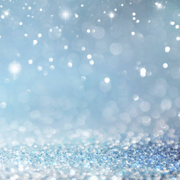 istock Christmas light background.  Holiday glowing backdrop. Defocused Background With Blinking Stars. Blurred Bokeh. 1011503640