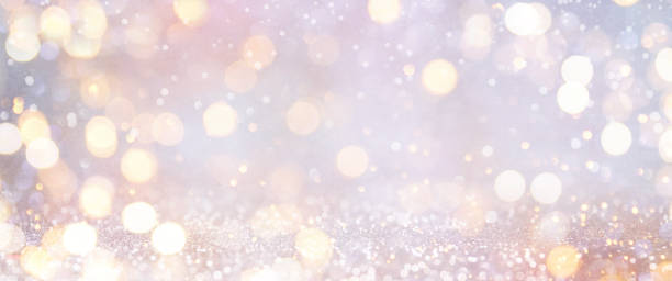 istock Christmas light background.  Holiday glowing backdrop. Defocused Background With Blinking Stars. Blurred Bokeh. 1011505400
