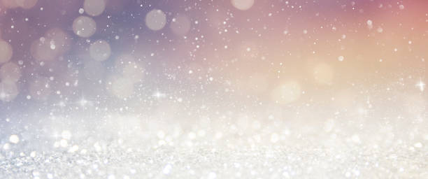 istock Christmas light background.  Holiday glowing backdrop. Defocused Background With Blinking Stars. Blurred Bokeh. 1011505444