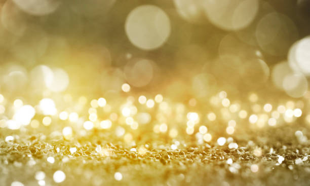 istock Christmas light background.  Holiday glowing backdrop. Defocused Background With Blinking Stars. Blurred Bokeh. 1011505848