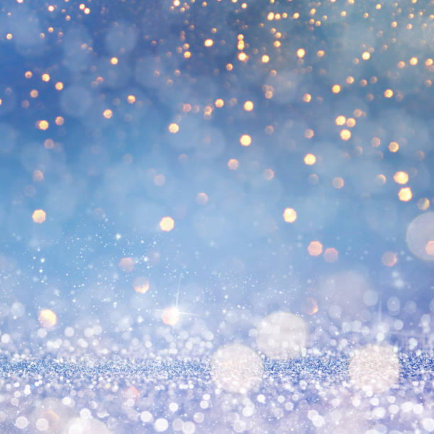 istock Christmas light background.  Holiday glowing backdrop. Defocused Background With Blinking Stars. Blurred Bokeh. 1011511402