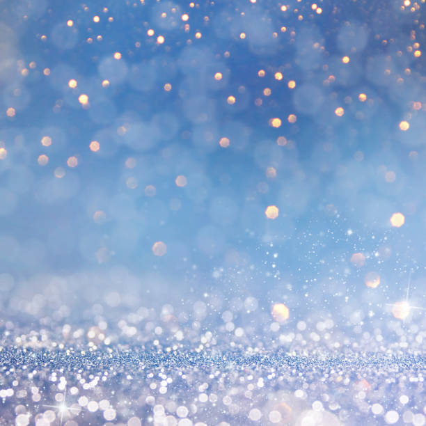 istock Christmas light background.  Holiday glowing backdrop. Defocused Background With Blinking Stars. Blurred Bokeh. 1011513476