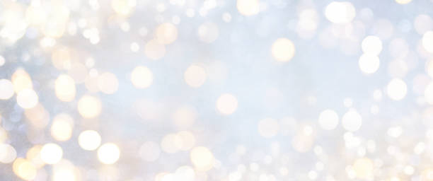 istock Christmas light background.  Holiday glowing backdrop. Defocused Background With Blinking Stars. Blurred Bokeh. 1011513626