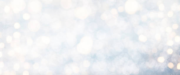 istock Blurred bokeh light background, Christmas and New Year holidays background 1011514686