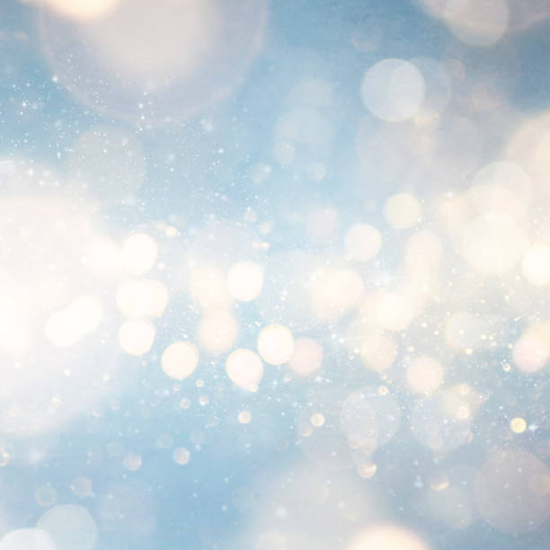 istock Christmas light background.  Holiday glowing backdrop. Defocused Background With Blinking Stars. Blurred Bokeh. 1011515174
