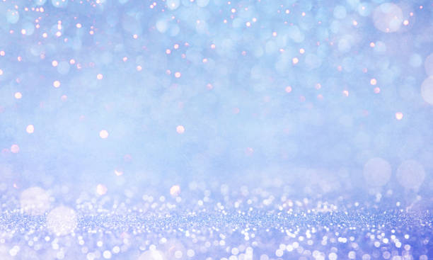istock Christmas light background.  Holiday glowing backdrop. Defocused Background With Blinking Stars. Blurred Bokeh. 1011517378