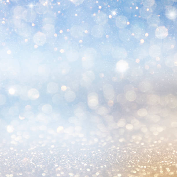 istock Christmas light background.  Holiday glowing backdrop. Defocused Background With Blinking Stars. Blurred Bokeh. 1011517420