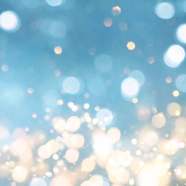 istock Christmas light background.  Holiday glowing backdrop. Defocused Background With Blinking Stars. Blurred Bokeh. 1011517604