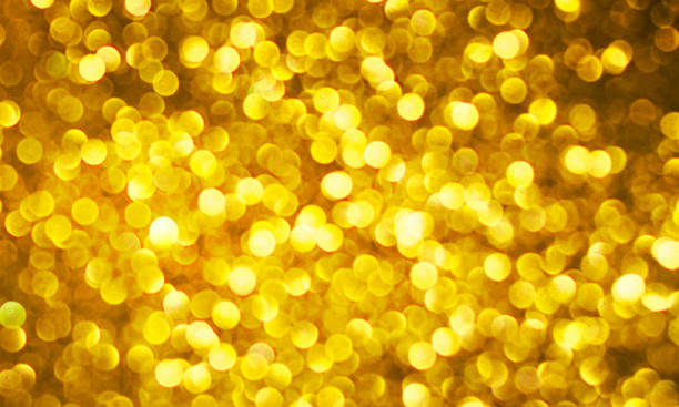 istock Christmas light background.  Holiday glowing backdrop. Defocused Background With Blinking Stars. Blurred Bokeh. 1011517990