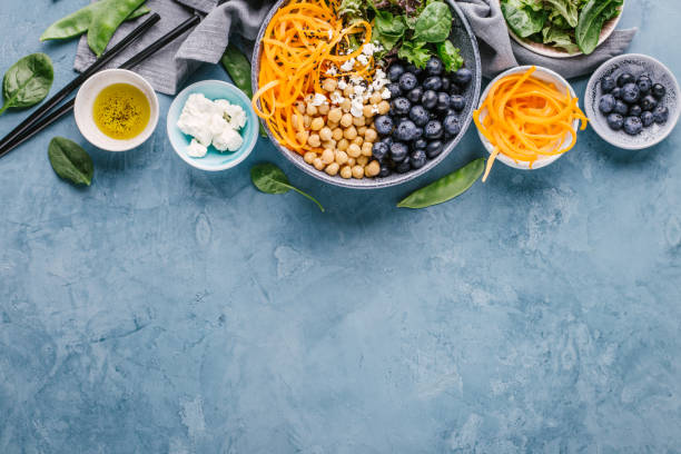 istock Ingredients for Buddha bowl salad with fresh vegetables 1011539062