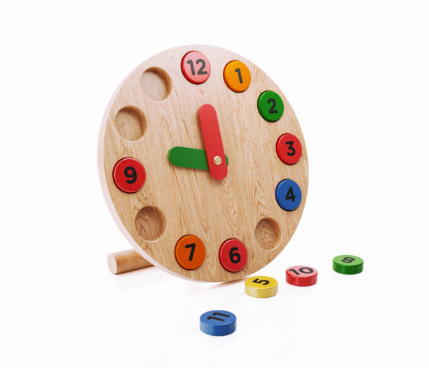 istock Educational Wooden Toy Clock On White Background 1011542024