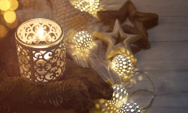 istock Cosy and soft winter background, knitted sweater and lights 1011548180