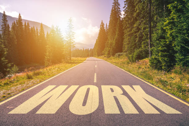 istock Work word written on road in the mountains 1011559442