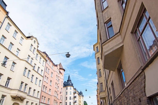 Vasastan typical century old buildings in yellow roughcast in Stockholm, Sweden.