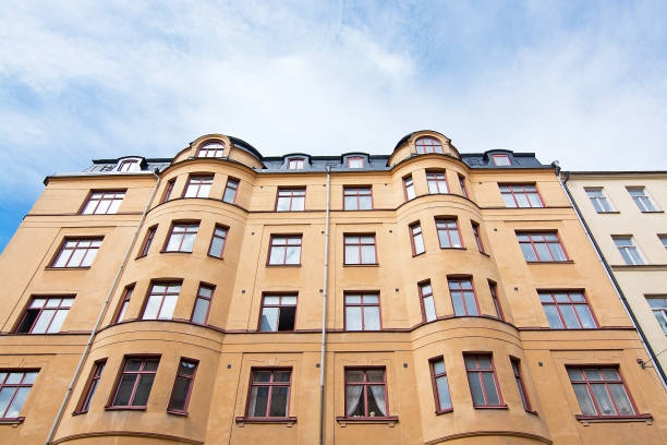 istock Vasastan typical century old buildings in yellow roughcast 1011564098