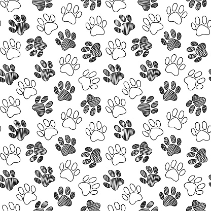 Monochrome black and white dog cat pet animal paw foot hand drawn ink sketch seamless pattern texture background vector.