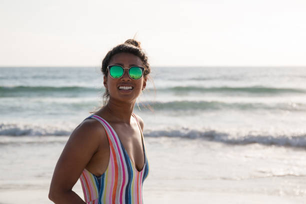 istock Woman on the beach 1011584070