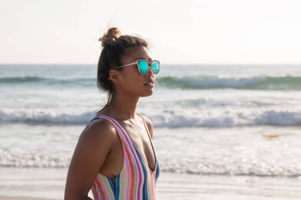 istock Woman on the beach 1011584072
