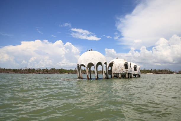 istock Blue sky over the Cape Romano dome house ruins 1011598520