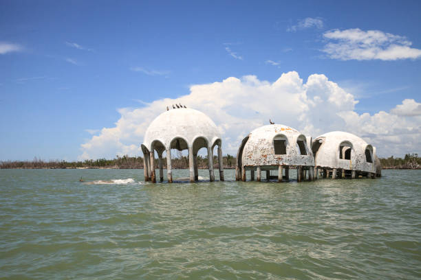 istock Blue sky over the Cape Romano dome house ruins 1011598542