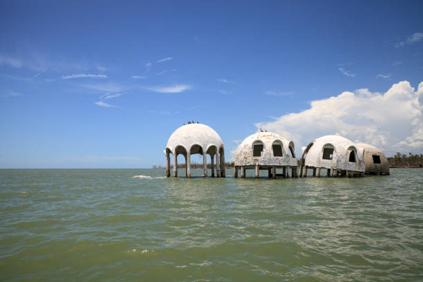 istock Blue sky over the Cape Romano dome house ruins 1011601474
