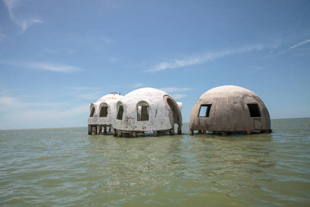 istock Blue sky over the Cape Romano dome house ruins 1011604840