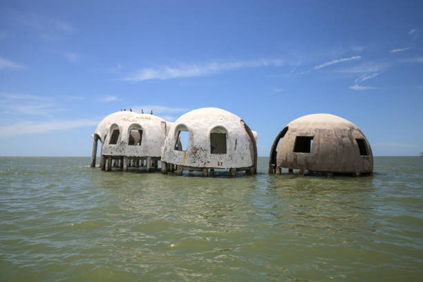 istock Blue sky over the Cape Romano dome house ruins 1011604894